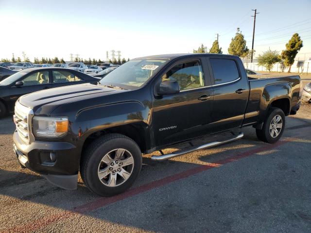 GMC CANYON SLE 2016 with VIN 1GTG5CE36G1231834 - Photo from auction