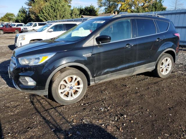 FORD ESCAPE SE 2018 with VIN 1FMCU9GD4JUB37138 - Photo from auction