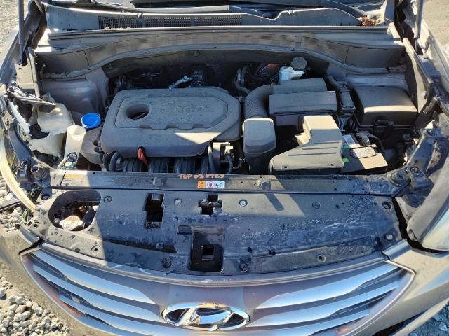Photo 11 from auction – 2017 HYUNDAI SANTA FE S with VIN 5NMZU3LB8HH003329