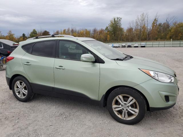Photo 4 from auction – 2012 HYUNDAI TUCSON GLS with VIN KM8JUCAC7CU419152