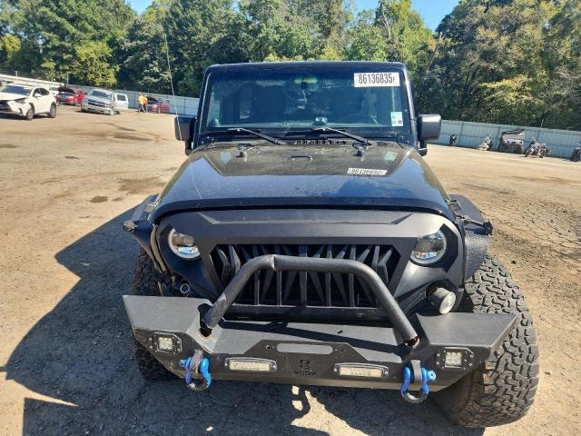 Photo 5 from auction – 2014 JEEP WRANGLER U with VIN 1C4BJWDGXEL218839