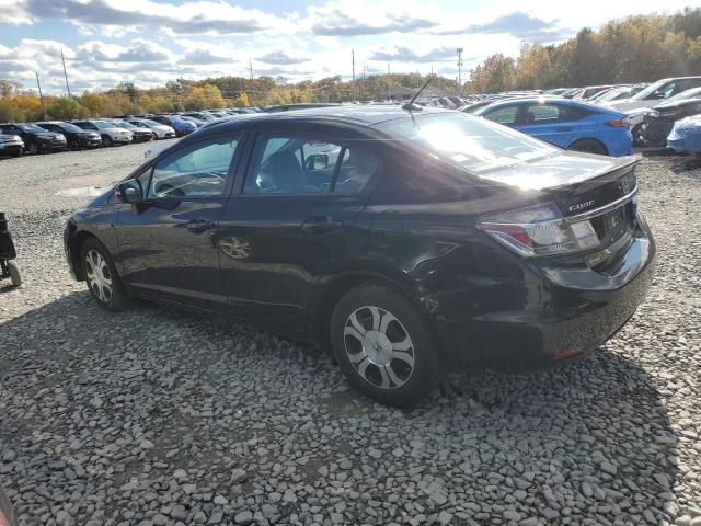 Photo 2 from auction – 2013 HONDA CIVIC HYBR with VIN 19XFB4F20DE200023