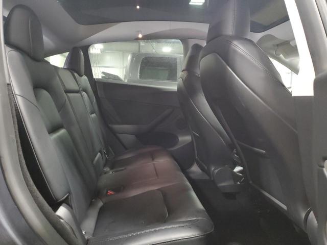 Photo 11 from auction – 2023 TESLA MODEL Y with VIN 7SAYGDEE2PF840709