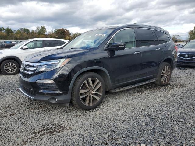 HONDA PILOT ELIT 2016 with VIN 5FNYF6H02GB064819 - Photo from auction