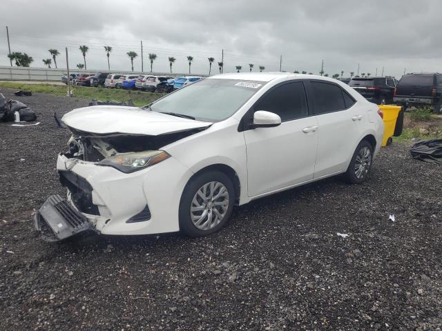 TOYOTA COROLLA L 2018 with VIN 5YFBURHE1JP791583 - Photo from auction