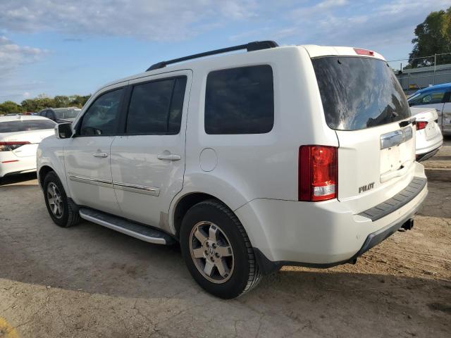 Photo 2 from auction – 2011 HONDA PILOT TOUR with VIN 5FNYF3H98BB032379