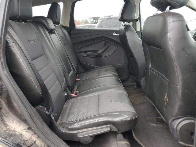 Photo 11 from auction – 2014 FORD ESCAPE SE with VIN 1FMCU9G98EUD87628