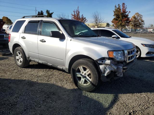 Photo 4 from auction – 2011 FORD ESCAPE with VIN 1FMCU0D71BKA27820