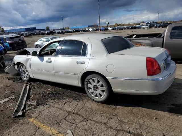 Photo 2 from auction – 2004 LINCOLN TOWN CAR U with VIN 1LNHM83WX4Y688520