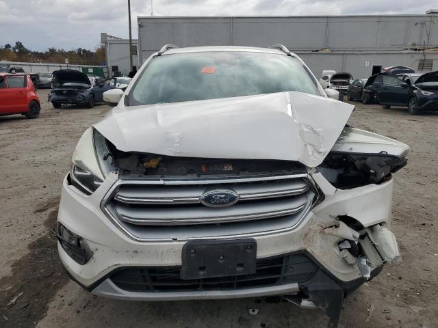 Photo 5 from auction – 2017 FORD ESCAPE TIT with VIN 1FMCU9J96HUD06574