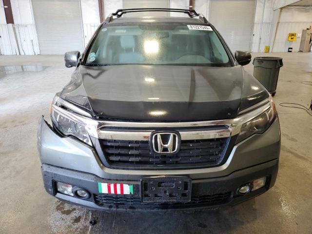 Photo 5 from auction – 2017 HONDA RIDGELINE with VIN 5FPYK2F63HB011700