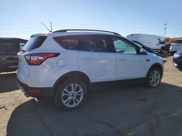 Photo 3 from auction – 2017 FORD ESCAPE SE with VIN 1FMCU9GDXHUE17740