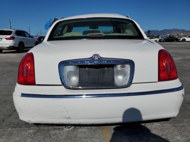 Photo 6 from auction – 2002 LINCOLN TOWN CAR E with VIN 1LNHM81W32Y670389