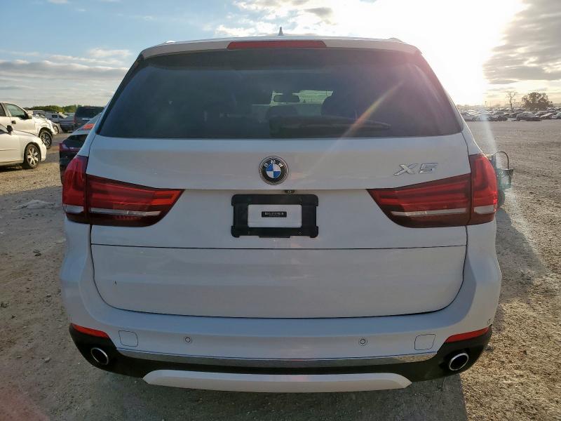 Photo 6 from auction – 2014 BMW X5 XDRIVE3 with VIN 5UXKS4C59E0J94101