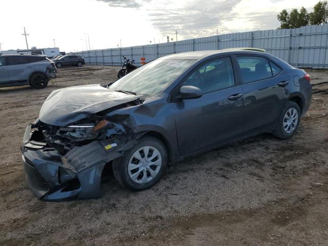 TOYOTA COROLLA L 2019 with VIN 5YFBURHE0KP894950 - Photo from auction