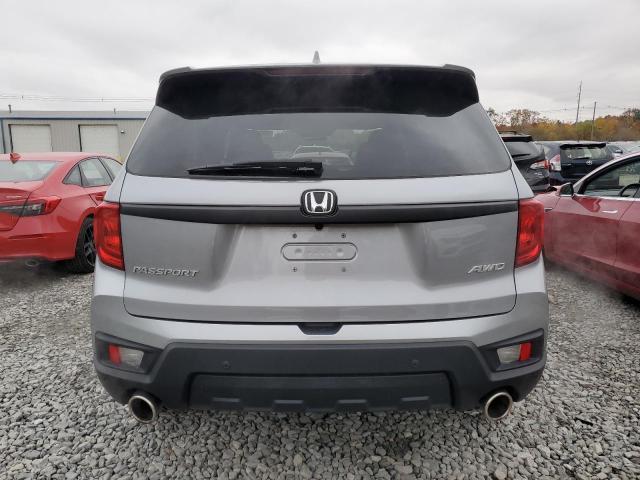 Photo 6 from auction – 2022 HONDA PASSPORT E with VIN 5FNYF8H55NB030104