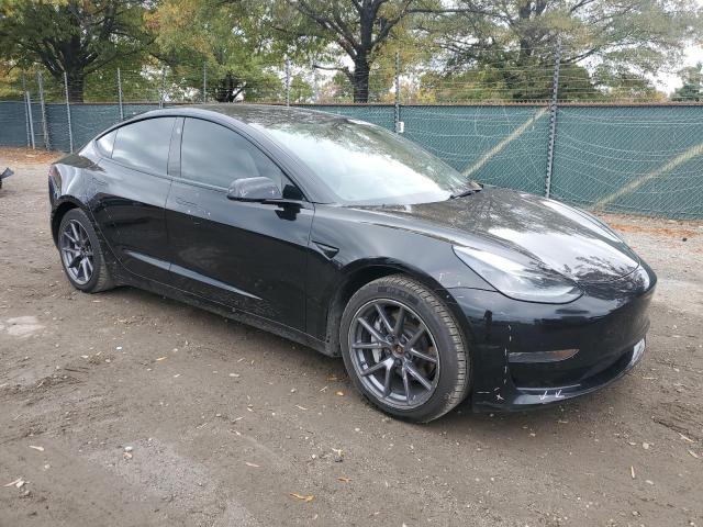 Photo 4 from auction – 2022 TESLA MODEL 3 with VIN 5YJ3E1EB3NF101363