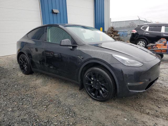 Photo 4 from auction – 2024 TESLA MODEL Y with VIN 7SAYGDEE6RF989661