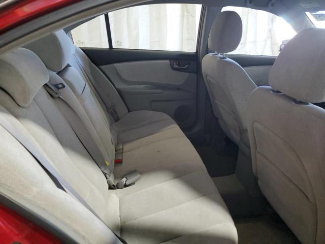 Photo 10 from auction – 2006 KIA OPTIMA LX with VIN KNAGE123065079806