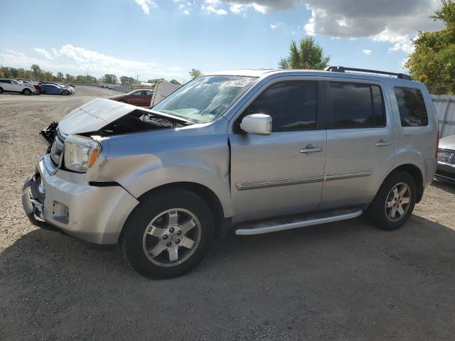 HONDA PILOT TOUR 2011 with VIN 5FNYF4H95BB058766 - Photo from auction