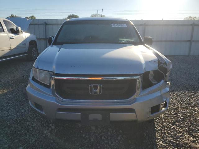 Photo 5 from auction – 2011 HONDA RIDGELINE with VIN 5FPYK1F26BB452090