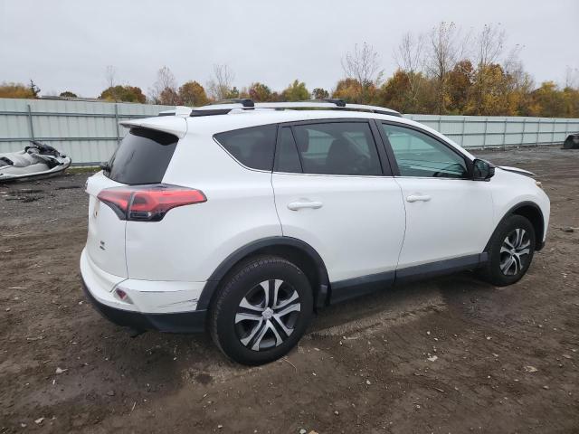 Photo 3 from auction – 2016 TOYOTA RAV4 LE with VIN 2T3BFREV8GW513289