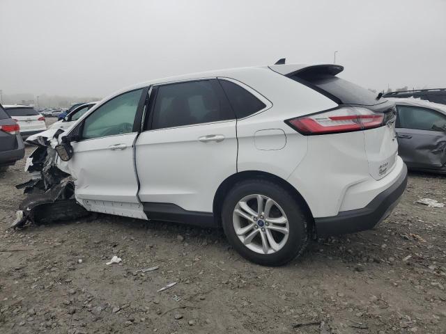 Photo 2 from auction – 2020 FORD EDGE with VIN 2FMPK4J92LBB11001