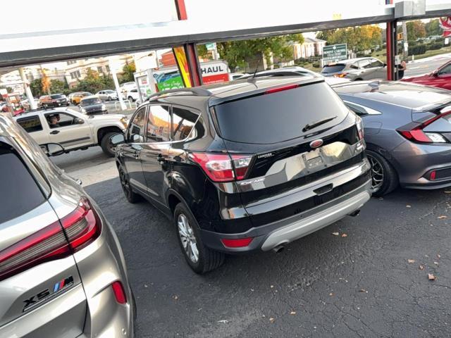 Photo 3 from auction – 2018 FORD ESCAPE SE with VIN 1FMCU0GD8JUA75237