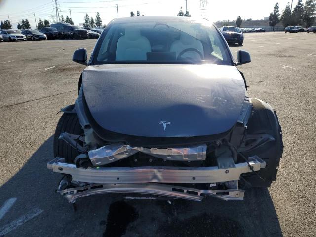 Photo 5 from auction – 2023 TESLA MODEL Y with VIN 7SAYGAEE2PF646213