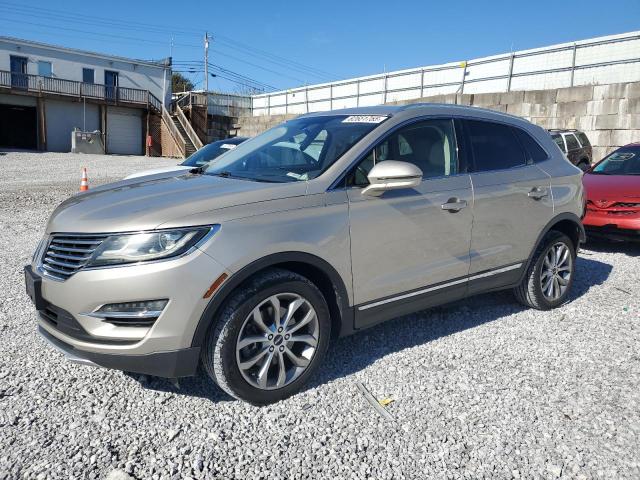 LINCOLN MKC 2015 with VIN 5LMTJ2AH0FUJ33877 - Photo from auction