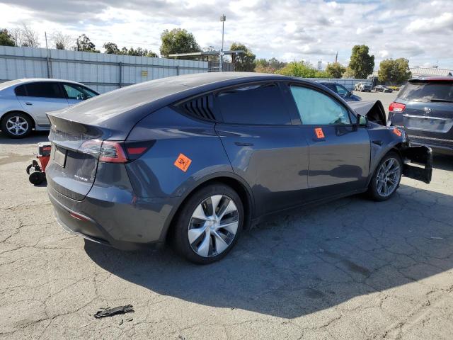 Photo 3 from auction – 2022 TESLA MODEL Y with VIN 7SAYGAEE2NF345566