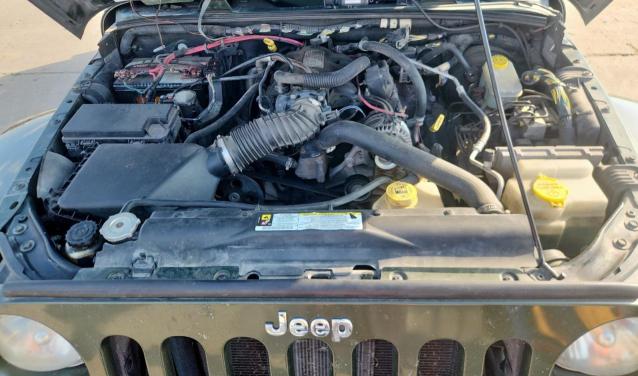 Photo 11 from auction – 2007 JEEP WRANGLER U with VIN 1J4GB59197L110307