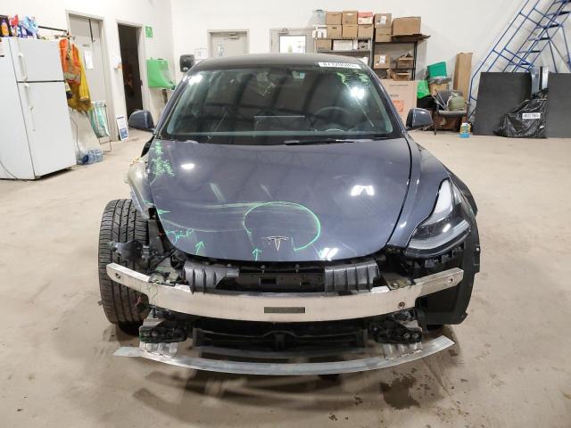 Photo 5 from auction – 2022 TESLA MODEL 3 with VIN 5YJ3E1EA8NF164689
