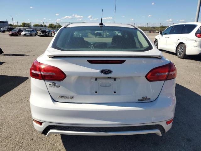 Photo 6 from auction – 2015 FORD FOCUS SE with VIN 1FADP3F24FL355595