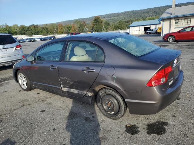 Photo 2 from auction – 2011 HONDA CIVIC LX with VIN 19XFA1F58BE046640