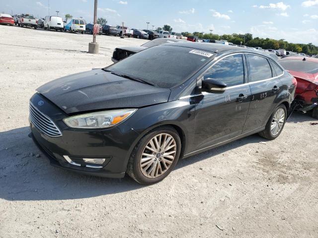 FORD FOCUS TITANIUM 2015 with VIN 1FADP3J20FL260717 - Photo from auction