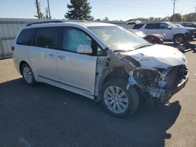 Photo 4 from auction – 2015 TOYOTA SIENNA XLE with VIN 5TDDK3DC6FS094523