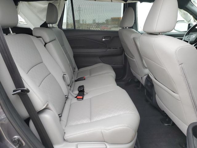 Photo 11 from auction – 2021 HONDA PASSPORT E with VIN 5FNYF8H51MB012391