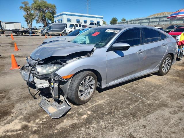 HONDA CIVIC EX 2018 with VIN 2HGFC2F79JH605652 - Photo from auction