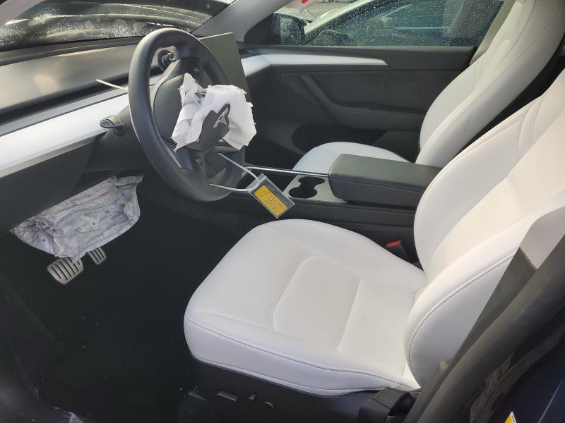 Photo 7 from auction – 2023 TESLA MODEL Y with VIN 7SAYGDEF7PF811344
