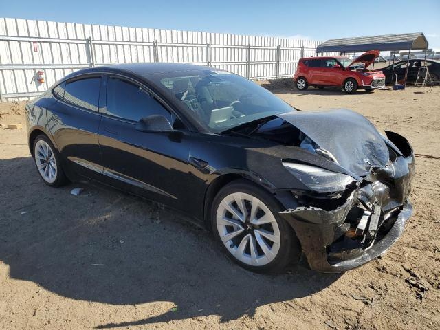 Photo 4 from auction – 2022 TESLA MODEL 3 with VIN 5YJ3E1EBXNF164704