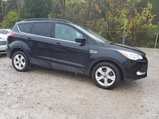 Photo 4 from auction – 2014 FORD ESCAPE SE with VIN 1FMCU0GX1EUD64105