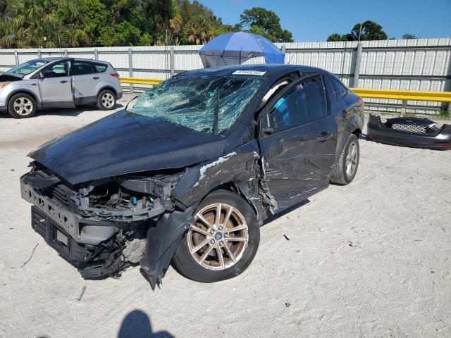 FORD FOCUS SE 2017 with VIN 1FADP3F21HL338207 - Photo from auction