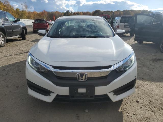 Photo 5 from auction – 2018 HONDA CIVIC EX with VIN 19XFC2F72JE207046