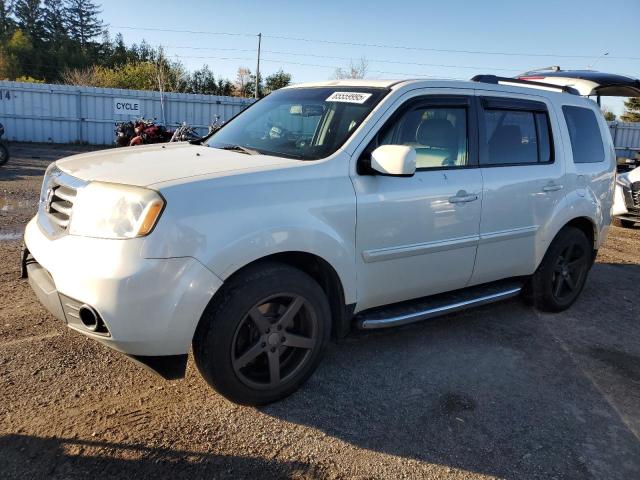 HONDA PILOT EXL 2012 with VIN 5FNYF4H50CB505809 - Photo from auction