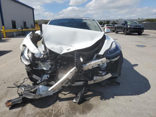 Photo 5 from auction – 2023 TESLA MODEL 3 with VIN 5YJ3E1EAXPF563560