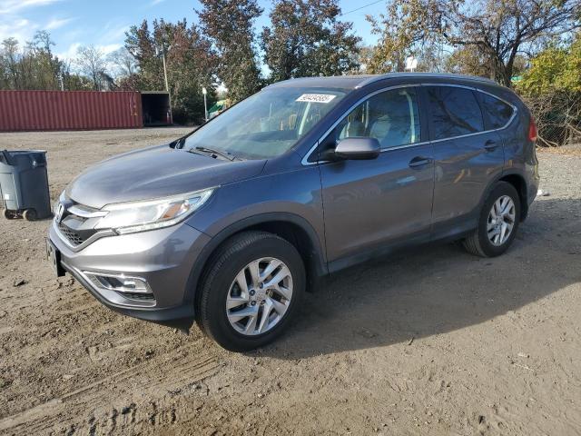 HONDA CR-V EXL 2015 with VIN 2HKRM4H70FH661933 - Photo from auction
