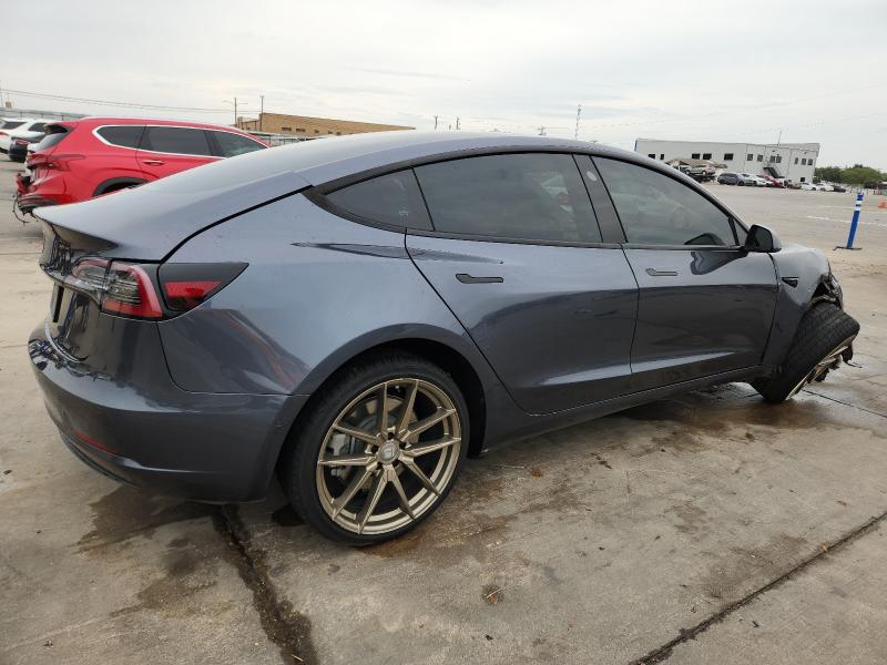Photo 3 from auction – 2022 TESLA MODEL 3 with VIN 5YJ3E1EAXNF185902