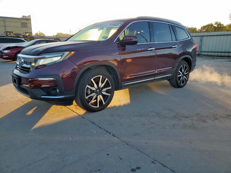 HONDA PILOT ELIT 2019 with VIN 5FNYF6H09KB072182 - Photo from auction