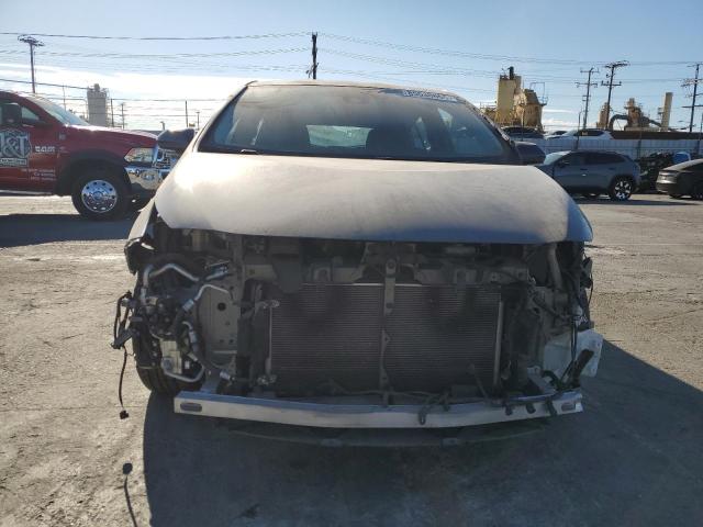 Photo 5 from auction – 2021 TOYOTA PRIUS PRIM with VIN JTDKAMFP7M3176372
